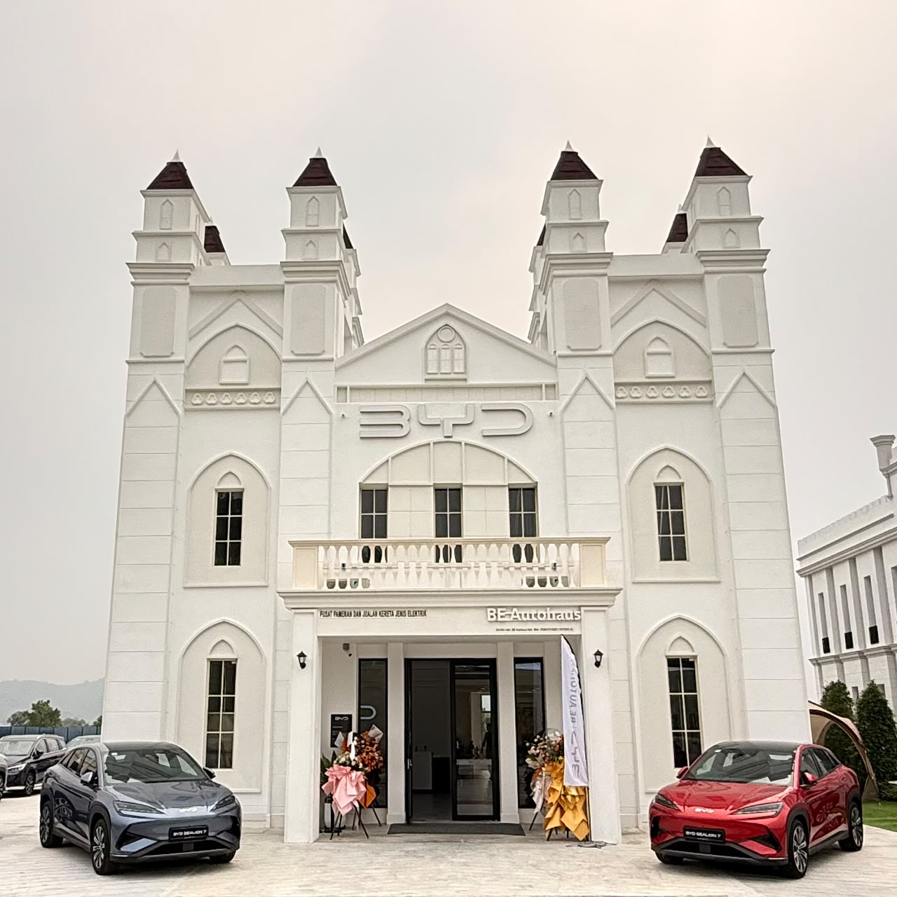 The European-inspired exterior design of the new BYD Rawang showroom featuring electric vehicles on display