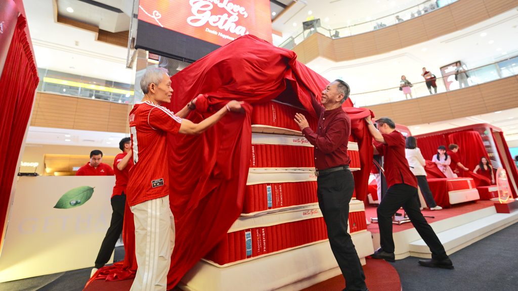 Official launch gimmick unveiling the Getha wedding mattress collection by company representatives