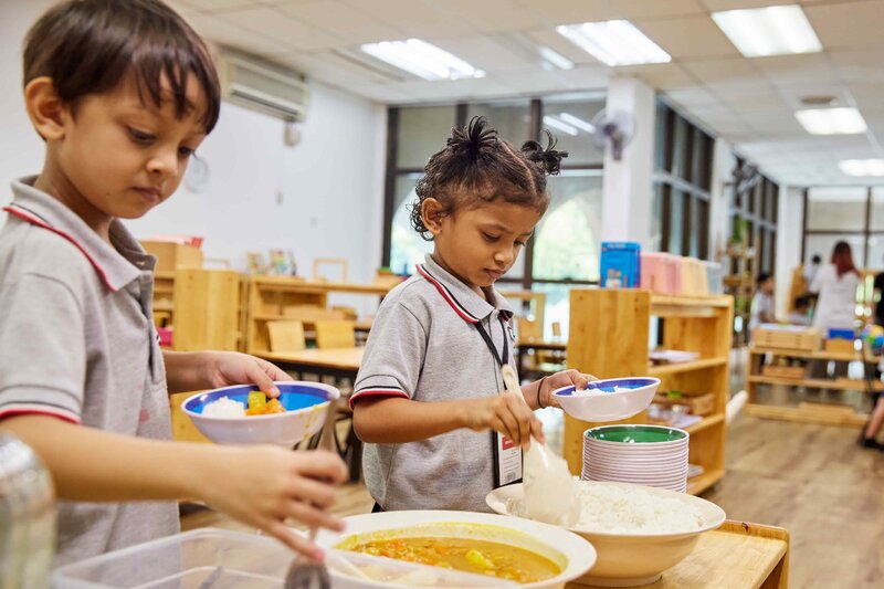 Underprivileged students receiving healthy food during the Daily Meals Programme supported by Hektar REIT